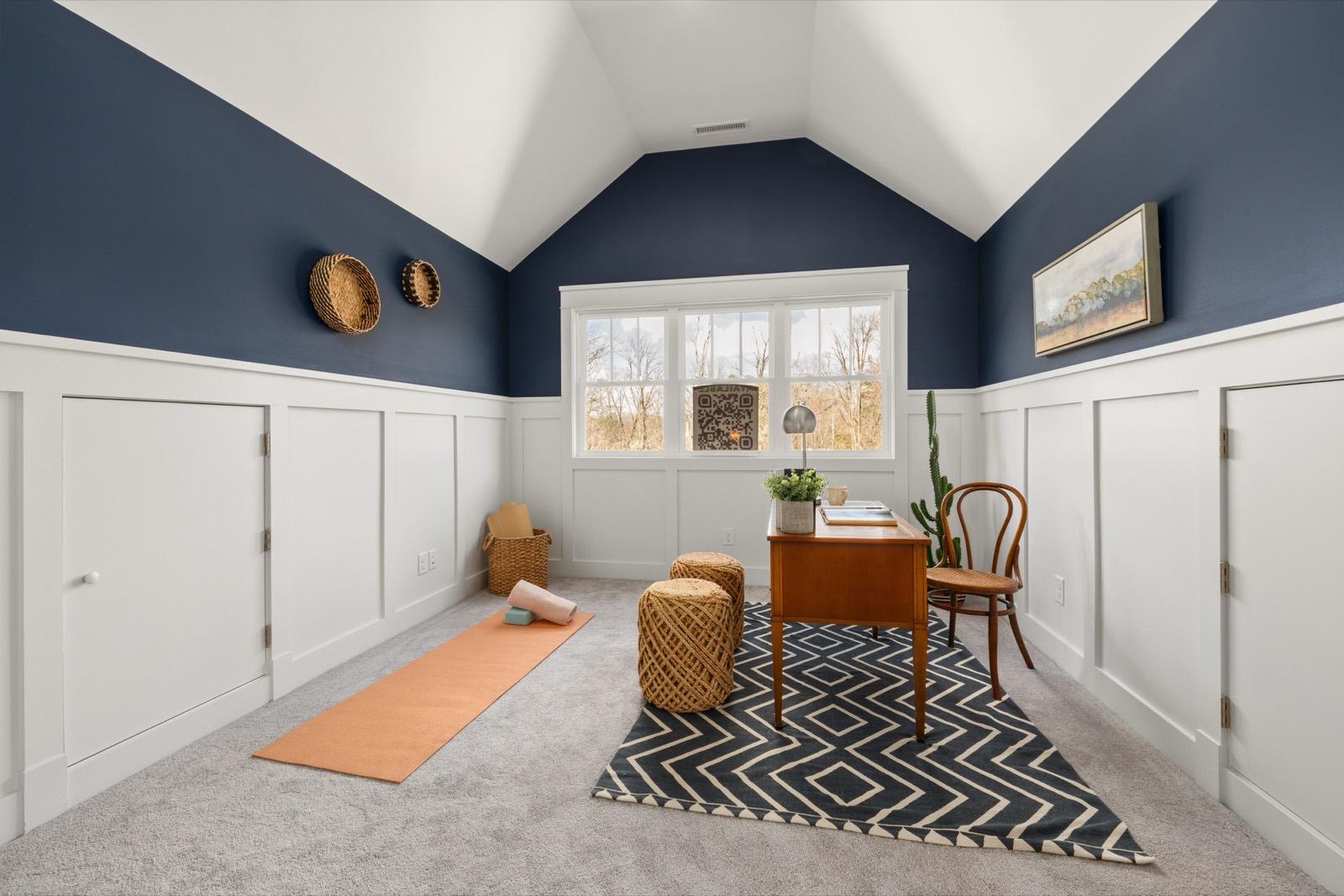Bonus room with navy walls and board-and-batten wainscot — AMV Construction, Charlotte NC